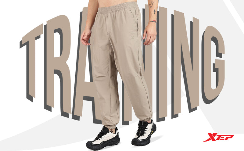 XTEP Men's Comfort Tech Woven Outdoor Training Pants