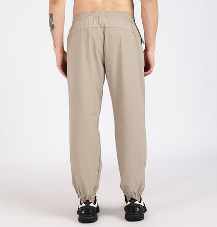 XTEP Men's Comfort Tech Woven Outdoor Training Pants